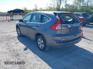 2015 Honda CR-V LX with VIN 2HKRM3H31FH557779, listed as a IAAI auction lot 42098299 with 211,683 mi miles and . Bid and sale history available at carsss.com. Image 3.