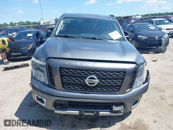 2017 Nissan Titan SV z VIN 1N6AA1E55HN551578, wystawiony jako IAAI lot #42392063 z przebiegiem 123 077 mil mil oraz . Historia ofert i sprzedaży dostępna na DreamBid. Obrazek 13.