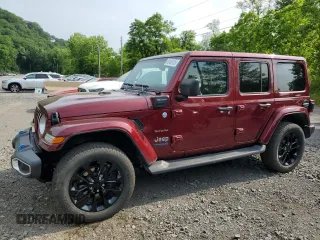 2022 Jeep Wrangler Unlimited Sahara with VIN 1C4JJXP62NW170448, listed as a Copart auction lot 60100125 with 28,655 mi miles and Salvage title. Bid and sale history available at DreamBid. Image 1.