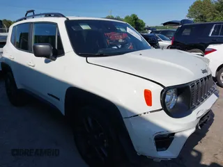 2021 Jeep Renegade Latitude z VIN ZACNJCBB0MPM69573, wystawiony jako IAAI lot #42137801 z przebiegiem 76 472 mil mil oraz . Historia ofert i sprzedaży dostępna na DreamBid. Obrazek 1.
