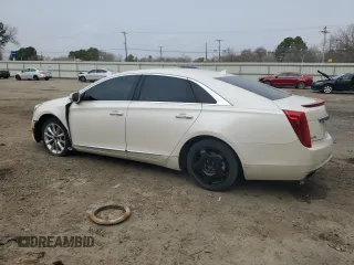2014 Cadillac XTS Luxury with VIN 2G61M5S37E9190425, listed as a Copart auction lot 79697794 with 182,566 mi miles and Salvage Title. Bid and sale history available at DreamBid. Image 2.