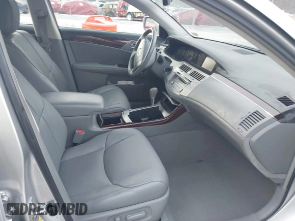2009 Toyota Avalon XL with VIN 4T1BK36B69U329378, listed as a IAAI auction lot 41387338 with 163,023 mi miles and . Bid and sale history available at carsss.com. Image 5.