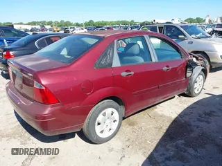 2007 Ford Focus S with VIN 1FAFP34N77W297780, listed as a IAAI auction lot 42074788 with 153,441 mi miles and . Bid and sale history available at carsss.com. Image 4.