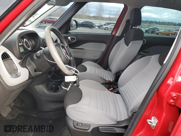 2014 FIAT 500L Easy with VIN ZFBCFABH9EZ002128, listed as a Copart auction lot 85312064 with 140,419 mi miles and Salvage Title. Bid and sale history available at carsss.com. Image 7.