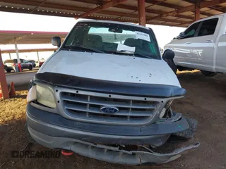 2002 Ford F-150 XL z VIN 1FTRX18L32NB45367, wystawiony jako IAAI lot #42618680 z przebiegiem 333 051 mil mil oraz . Historia ofert i sprzedaży dostępna na DreamBid. Obrazek 12.