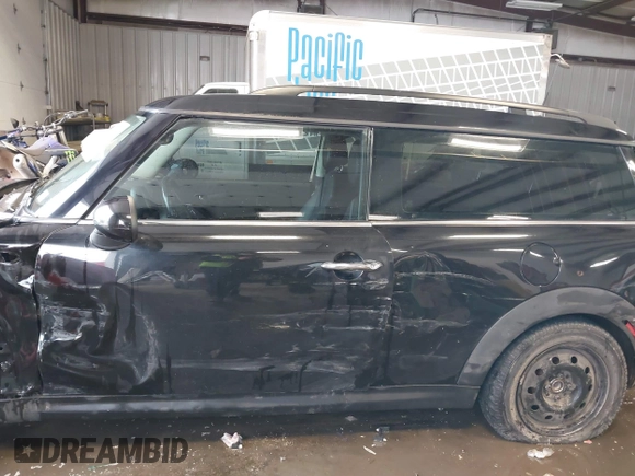 2011 MINI Clubman z VIN WMWZF3C50BT188693, wystawiony jako IAAI lot #41594216 z przebiegiem 156 768 mil mil oraz . Historia ofert i sprzedaży dostępna na DreamBid. Obrazek 15.