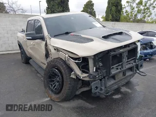 2022 Ram 1500 TRX with VIN 1C6SRFU92NN383774, listed as a IAAI auction lot 41788415 with 34,646 mi miles. Bid and sale history available at carsss.com. Image 1.