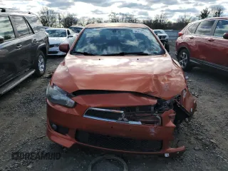2011 Mitsubishi Lancer GTS with VIN JA32U8FW6BU011215, listed as a Copart auction lot 86357004 with 128,577 mi miles and Salvage Title. Bid and sale history available at carsss.com. Image 5.