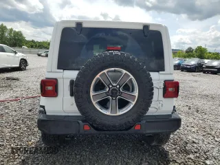 2019 Jeep Wrangler Unlimited Sahara z VIN 1C4HJXEG7KW561052, wystawiony jako Copart lot #58435725 z przebiegiem 72 777 mil mil oraz Szkoda całkowita • Salvage title. Historia ofert i sprzedaży dostępna na DreamBid. Obrazek 6.