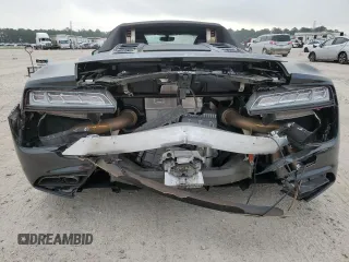 2018 Audi R8 z VIN WUAVACFX8J7900987, wystawiony jako Copart lot #45409684 z przebiegiem 6572 mil mil oraz . Historia ofert i sprzedaży dostępna na DreamBid. Obrazek 6.