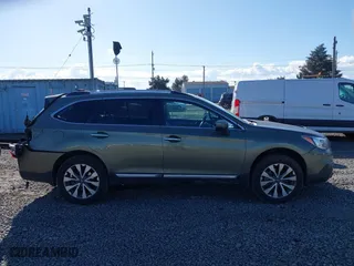2017 Subaru Outback Touring with VIN 4S4BSETC4H3216381, listed as a IAAI auction lot 41752855 with 64,236 mi miles. Bid and sale history available at carsss.com. Image 13.