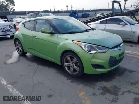 2012 Hyundai Veloster w/Gray Int z VIN KMHTC6AD3CU025315, wystawiony jako IAAI lot #42097741 z przebiegiem 146 726 mil mil oraz . Historia ofert i sprzedaży dostępna na DreamBid. Obrazek 1.