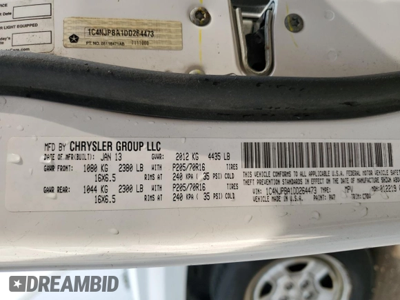 2013 Jeep Patriot Sport with VIN 1C4NJPBA1DD264473, listed as a Copart auction lot 59222735 with 165,206 mi miles and Salvage title. Bid and sale history available at DreamBid. Image 12.