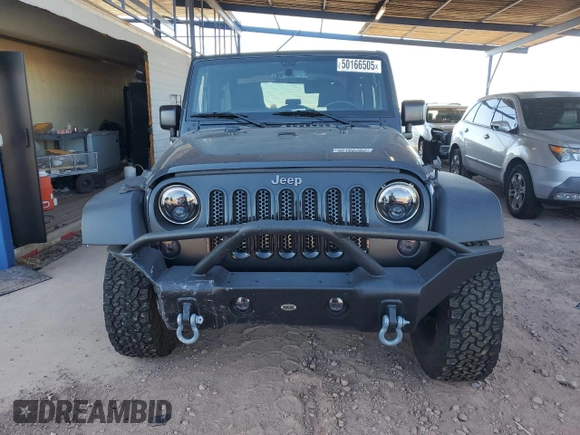 2017 Jeep Wrangler Sport with VIN 1C4AJWAG5HL662456, listed as a Copart auction lot 50166505 with 61,249 mi miles and Salvage Title. Bid and sale history available at DreamBid. Image 5.