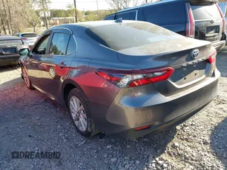 2024 Toyota Camry LE z VIN 4T1C11AK3RU847743, wystawiony jako IAAI lot #41886636 z przebiegiem 22 814 mil mil oraz . Historia ofert i sprzedaży dostępna na DreamBid. Obrazek 3.