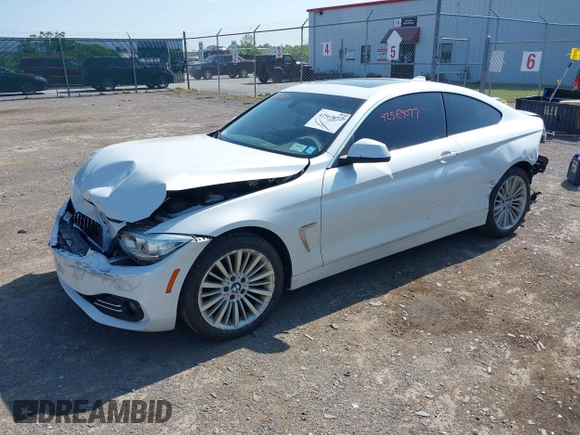 2015 BMW 4 Series 428i xDrive with VIN WBA3N5C52FK484864, listed as a IAAI auction lot 42569077 with 95,431 mi miles and . Bid and sale history available at DreamBid. Image 17.