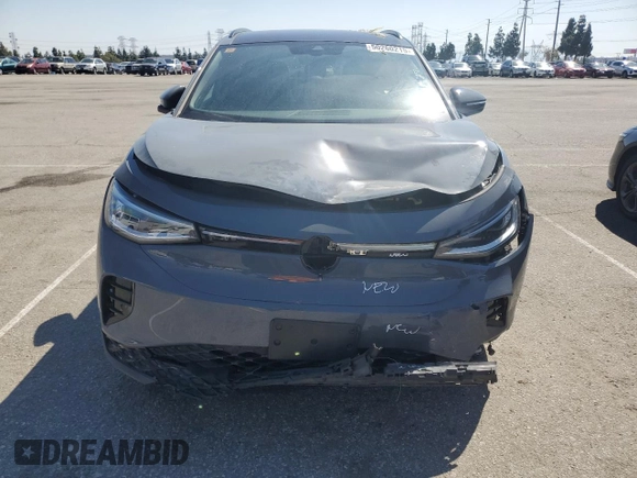 2023 Volkswagen ID.4 Pro with VIN 1V2VMPE86PC042164, listed as a Copart auction lot 50260215 with 4,328 mi miles and Clean Title. Bid and sale history available at DreamBid. Image 5.