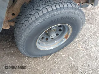2004 Jeep Wrangler Sport z VIN 1J4FA49S94P792689, wystawiony jako IAAI lot #42394196 z przebiegiem Nie podano mil oraz . Historia ofert i sprzedaży dostępna na DreamBid. Obrazek 12.