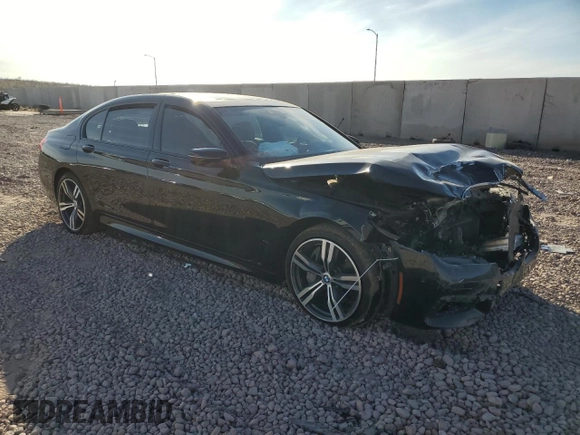 2018 BMW 7 Series 750i with VIN WBA7F0C57JGM23040, listed as a Copart auction lot 87392704 with 0 mi miles and Salvage Title. Bid and sale history available at carsss.com. Image 4.