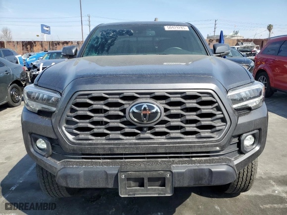 2022 Toyota Tacoma 4WD SR with VIN 3TMCZ5AN6NM511288, listed as a Copart auction lot 50429285 with 33,740 mi miles and Salvage Title. Bid and sale history available at carsss.com. Image 5.