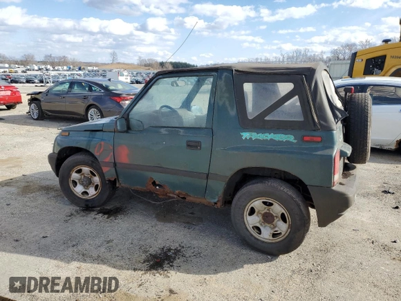 1996 Chevrolet Tracker z VIN 2CNBJ1863T6925397, wystawiony jako Copart lot #50446605 z przebiegiem 139 484 mil mil oraz Czysty tytuł • Clean title. Historia ofert i sprzedaży dostępna na DreamBid. Obrazek 2.