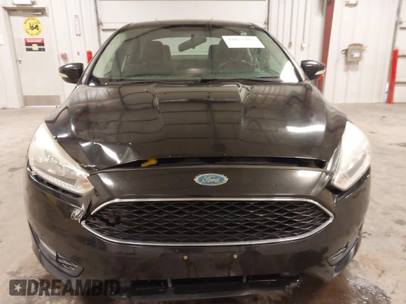 2015 Ford Focus SE with VIN 1FADP3F24FL255450, listed as a IAAI auction lot 41673301 with 103,650 mi miles. Bid and sale history available at carsss.com. Image 12.