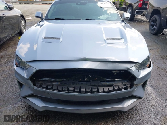 2022 Ford Mustang EcoBoost with VIN 1FA6P8TH8N5100076, listed as a IAAI auction lot 42476425 with 44,011 mi miles and . Bid and sale history available at DreamBid. Image 6.