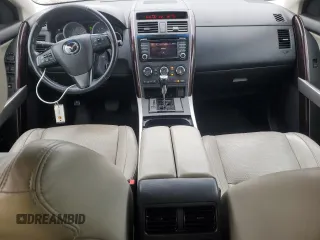 2013 Mazda CX-9 Grand Touring z VIN JM3TB3DV3D0412229, wystawiony jako Copart lot #57334325 z przebiegiem 146 976 mil mil oraz Czysty tytuł • Clean title. Historia ofert i sprzedaży dostępna na DreamBid. Obrazek 8.