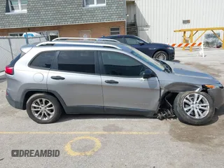2015 Jeep Cherokee Sport with VIN 1C4PJLAB2FW696010, listed as a IAAI auction lot 42032956 with 88,323 mi miles. Bid and sale history available at carsss.com. Image 13.