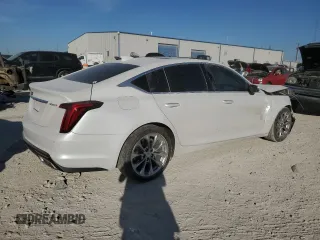 2021 Cadillac CT5 Premium Luxury с VIN 1G6DN5RK4M0146799, выставлен на аукционе Copart как лот 77460294 с пробегом 85 451 миль миль и Списание • Salvage title. История ставок и продаж доступна на DreamBid. Изображение 3.