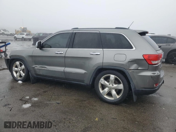 2013 Jeep Grand Cherokee Overland with VIN 1C4RJFCTXDC555233, listed as a Copart auction lot 44535045 with 104,721 mi miles and Clean Title. Bid and sale history available at carsss.com. Image 2.