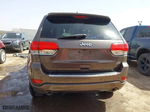 2020 Jeep Grand Cherokee Overland with VIN 1C4RJECG8LC323824, listed as a IAAI auction lot 41757922 with 64,792 mi miles. Bid and sale history available at carsss.com. Image 17.