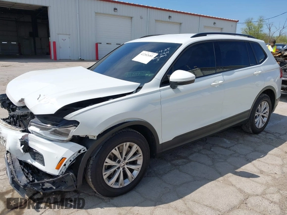 2019 Volkswagen Tiguan S with VIN 3VV0B7AX0KM027036, listed as a IAAI auction lot 42202681 with 75,192 mi miles and . Bid and sale history available at DreamBid. Image 18.
