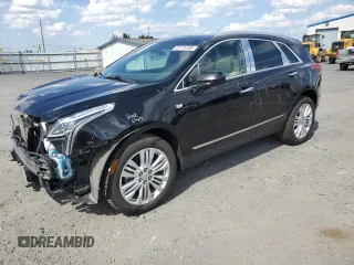 2018 Cadillac XT5 Premium Luxury FWD with VIN 1GYKNERS8JZ128120, listed as a Copart auction lot 62176165 with 49,279 mi miles and Salvage title. Bid and sale history available at DreamBid. Image 1.