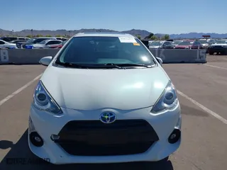 2015 Toyota Prius c One with VIN JTDKDTB37F1089798, listed as a IAAI auction lot 41838827 with 137,655 mi miles. Bid and sale history available at carsss.com. Image 6.