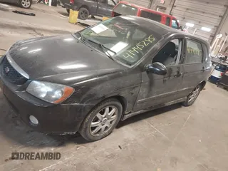 2005 Kia Spectra with VIN KNAFE161255083357, listed as a IAAI auction lot 41445285 with 90,349 mi miles. Bid and sale history available at carsss.com. Image 2.