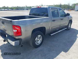 2013 Chevrolet Silverado 1500 LT with VIN 3GCPCSE01DG206827, listed as a IAAI auction lot 41976945 with 213,940 mi miles and . Bid and sale history available at DreamBid. Image 4.