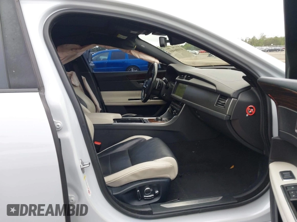 2018 Jaguar XF with VIN SAJBG4FV9JCY55697, listed as a IAAI auction lot 41406469 with 55,572 mi miles and . Bid and sale history available at DreamBid. Image 5.