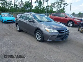 2015 Toyota Camry XLE with VIN 4T1BF1FK6FU935249, listed as a IAAI auction lot 42021192 with 132,248 mi miles. Bid and sale history available at carsss.com. Image 1.