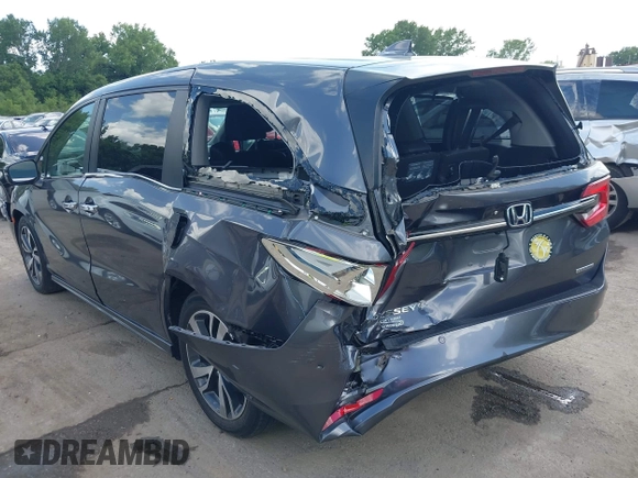 2022 Honda Odyssey Touring with VIN 5FNRL6H89NB008814, listed as a IAAI auction lot 42597738 with 49,933 mi miles and . Bid and sale history available at DreamBid. Image 3.