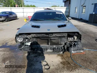 2019 Dodge Challenger SXT z VIN 2C3CDZAG2KH524724, wystawiony jako Copart lot #52202495 z przebiegiem 125 667 mil mil oraz Szkoda całkowita • Salvage title. Historia ofert i sprzedaży dostępna na DreamBid. Obrazek 5.