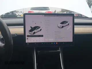 2020 Tesla Model 3 Long Range with VIN 5YJ3E1EB0LF803217, listed as a IAAI auction lot 41871940 with 130,391 mi miles. Bid and sale history available at carsss.com. Image 18.