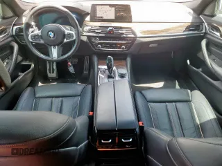 2019 BMW 5 Series M550i xDrive with VIN WBAJB9C51KB287797, listed as a Copart auction lot 65382465 with 61,459 mi miles and Salvage title. Bid and sale history available at DreamBid. Image 8.