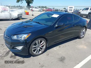 2013 Hyundai Genesis Coupe Track z VIN KMHHU6KJ6DU089065, wystawiony jako IAAI lot #42224509 z przebiegiem 104 918 mil mil oraz . Historia ofert i sprzedaży dostępna na DreamBid. Obrazek 17.