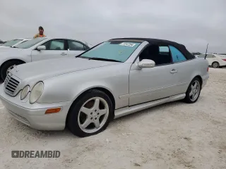 2000 Mercedes-Benz CLK 320/430 z VIN WDBLK70GXYT028555, wystawiony jako Copart lot #77247254 z przebiegiem Nie podano mil oraz Szkoda całkowita • Salvage title. Historia ofert i sprzedaży dostępna na DreamBid. Obrazek 1.