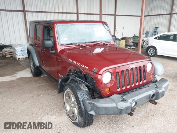 2010 Jeep Wrangler Unlimited Rubicon z VIN 1J4HA6H18AL180628, wystawiony jako IAAI lot #42110357 z przebiegiem 217 940 mil mil oraz . Historia ofert i sprzedaży dostępna na DreamBid. Obrazek 1.