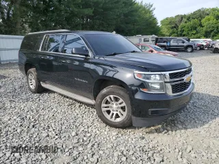 2015 Chevrolet Suburban LT with VIN 1GNSKJKC4FR192292, listed as a Copart auction lot 60434444 with 304,830 mi miles and Salvage Title. Bid and sale history available at DreamBid. Image 4.