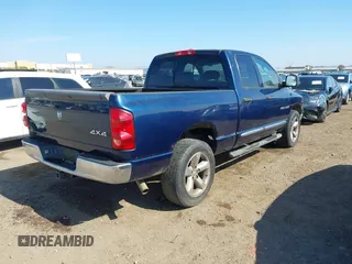 2007 Dodge 1500 SLT with VIN 1D7HU18207J606248, listed as a IAAI auction lot 42141047 with 128,821 mi miles. Bid and sale history available at carsss.com. Image 4.