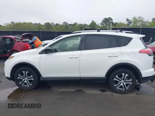 2017 Toyota RAV4 LE with VIN JTMZFREV9HJ704296, listed as a IAAI auction lot 41876996 with 85,605 mi miles and . Bid and sale history available at DreamBid. Image 14.