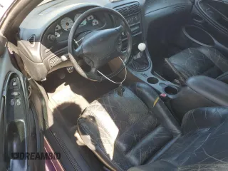 1997 Ford Mustang Cobra with VIN 1FALP47V0VF117976, listed as a Copart auction lot 72975454 with 165,076 mi miles and Salvage Title. Bid and sale history available at carsss.com. Image 8.